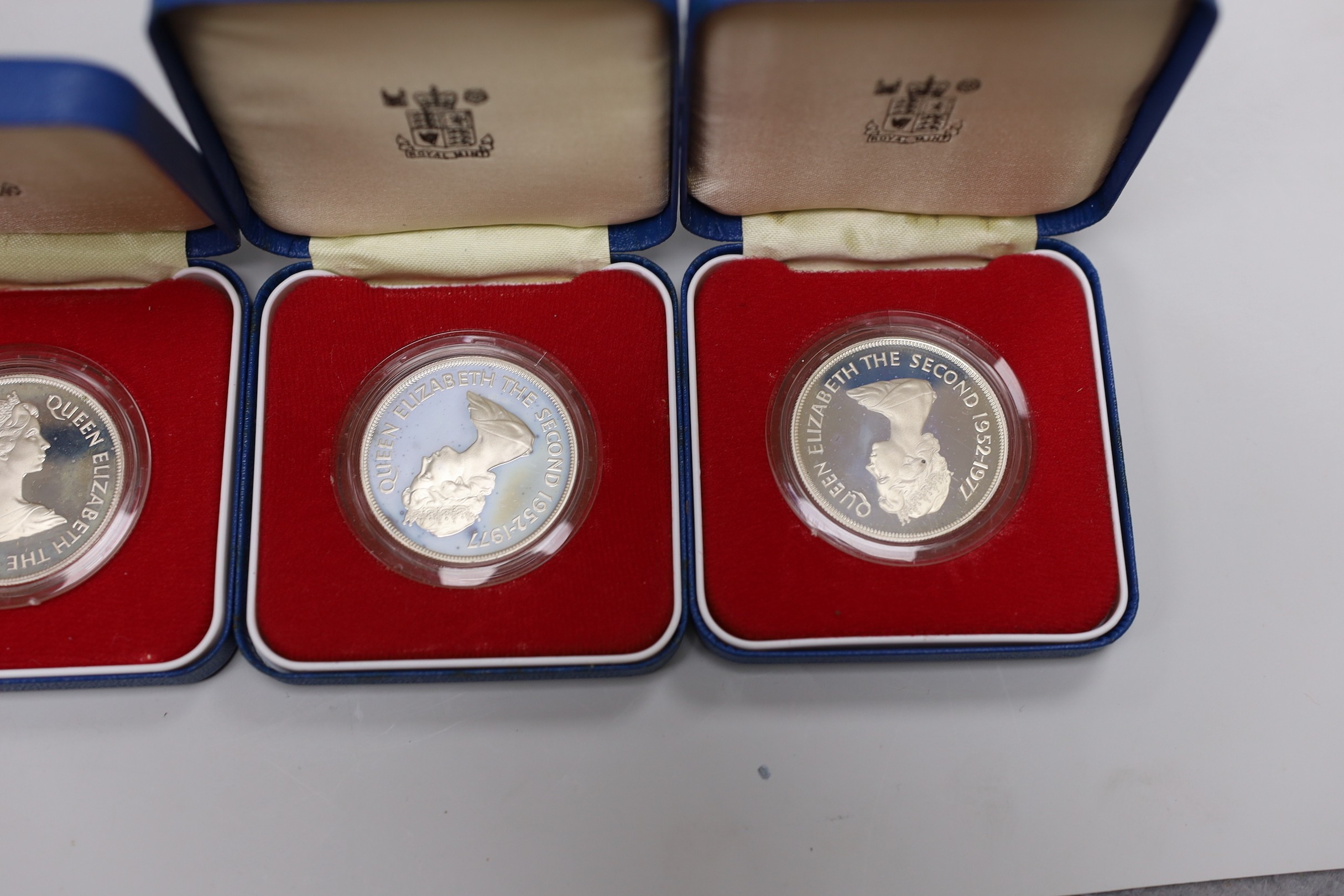 Eight Royal Mint QEII Commonwealth proof silver commemorative coins